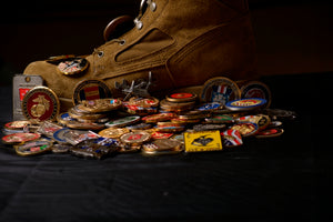 Challenge coins and a military boot