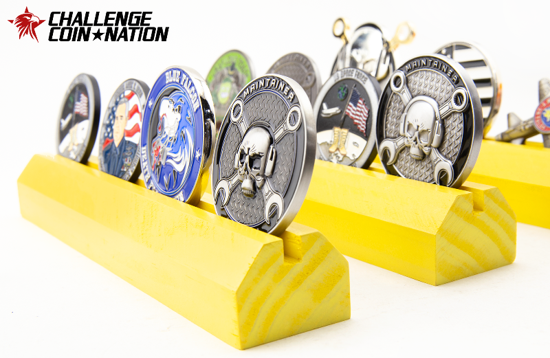 Challenge coin holder shaped like an aircraft wheel chock