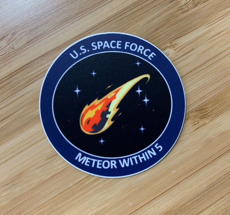  U.S. Space Force Meteor Within 5 Sticker by Challenge Coin Nation on a wooden surface
